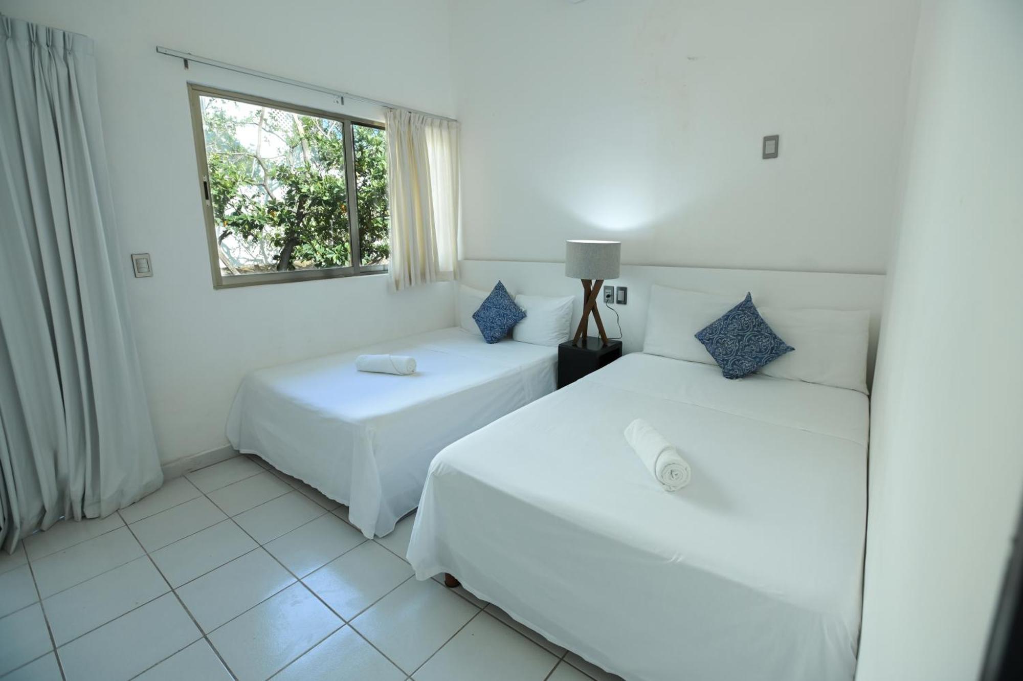 Kinta Kan Cabanas Hotel פלאייה דל כרמן מראה חיצוני תמונה